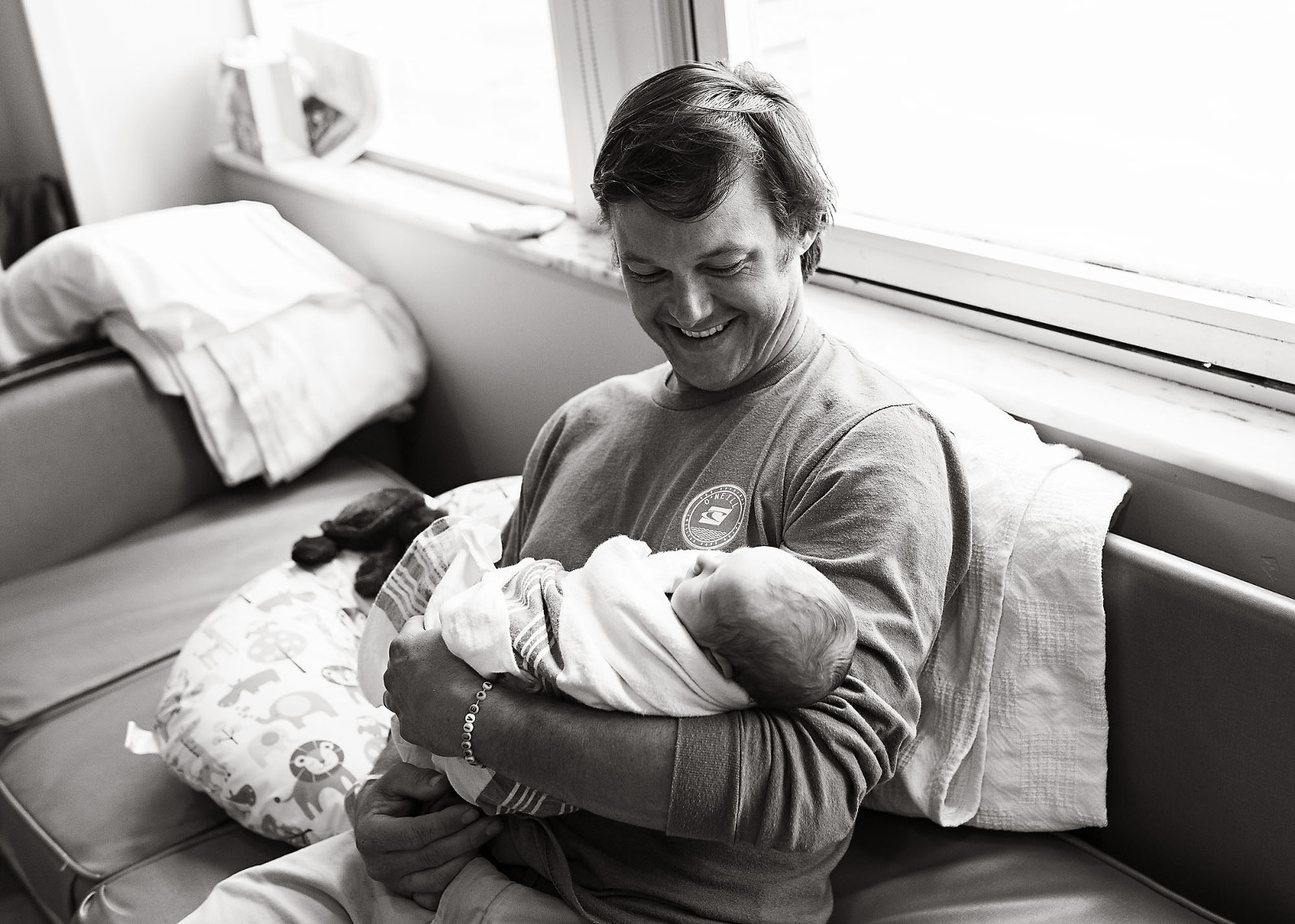 Daddy smiles at his newborn baby girl at Tulane Lakeside Hospital