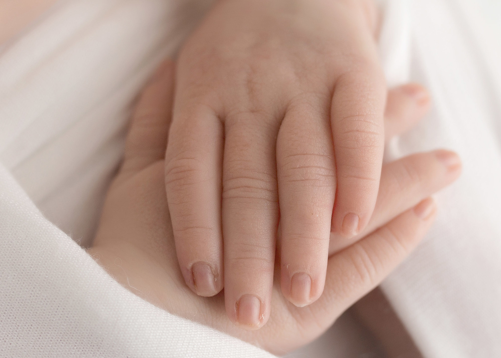 macro details of newborn hands