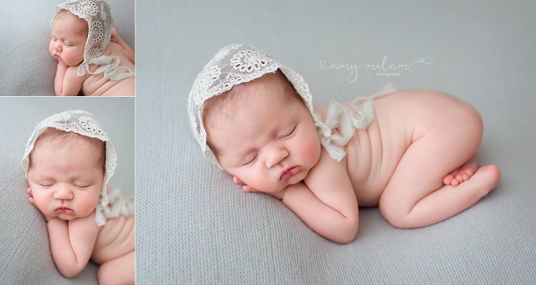 newborn girl with white lace bonnet