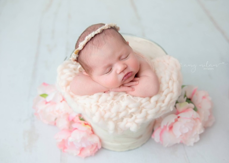 newborn girl with florals