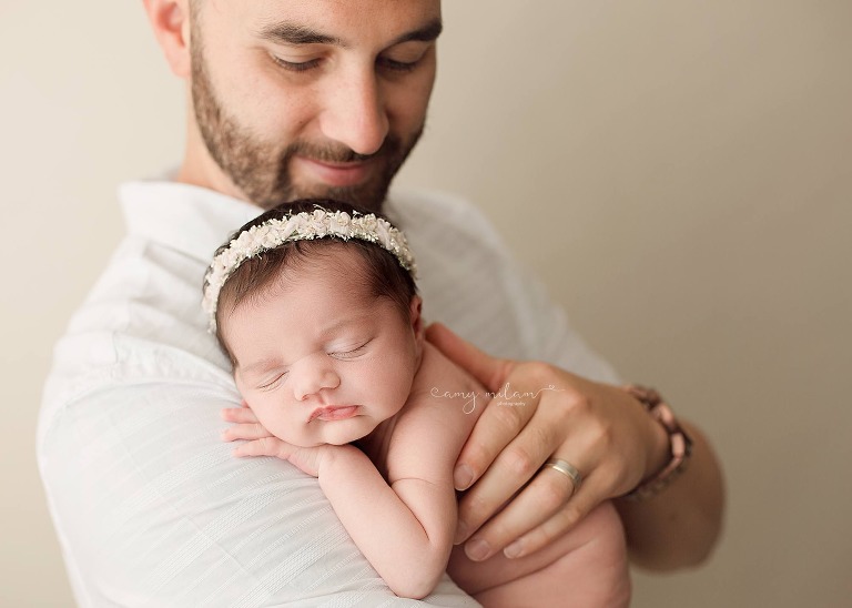 Daddy's girl newborn session in New Orleans.
